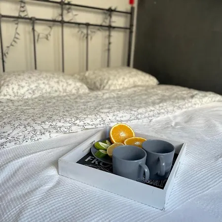 Grey Gucci Center Apartment